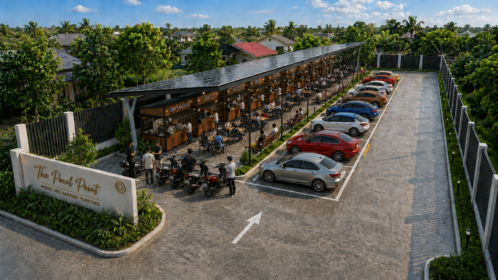 The Food Strip at Lot 1 by day — modular food kiosks, open-air dining, and angled parking